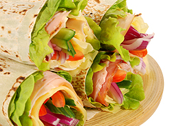 tasty lunch wrap with turkey 